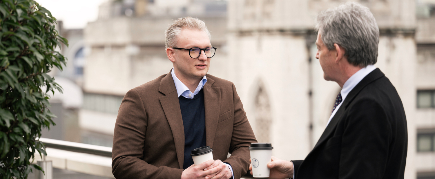 James Morris professional Indemnity solicitor speaking with partner