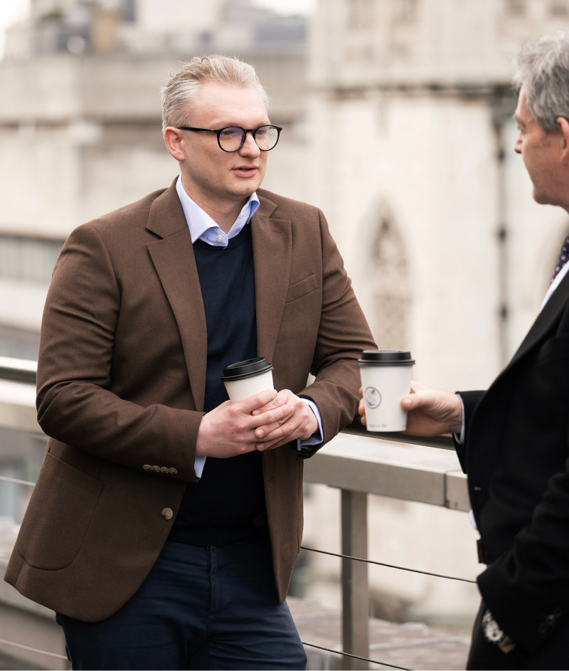 James Morris professional Indemnity solicitor speaking with partner