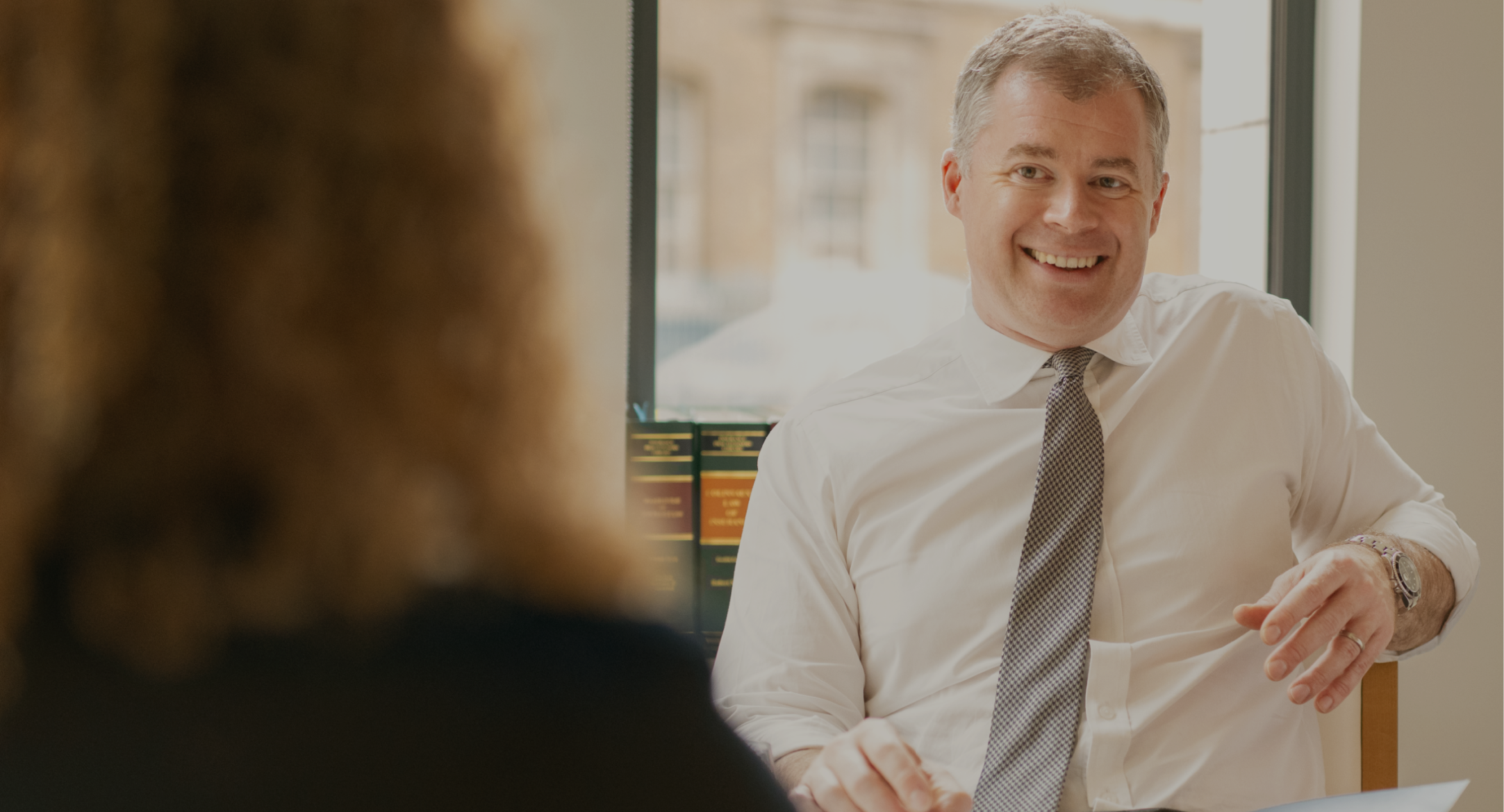 Happy Tom Pangbourne indemnity professional in conversation
